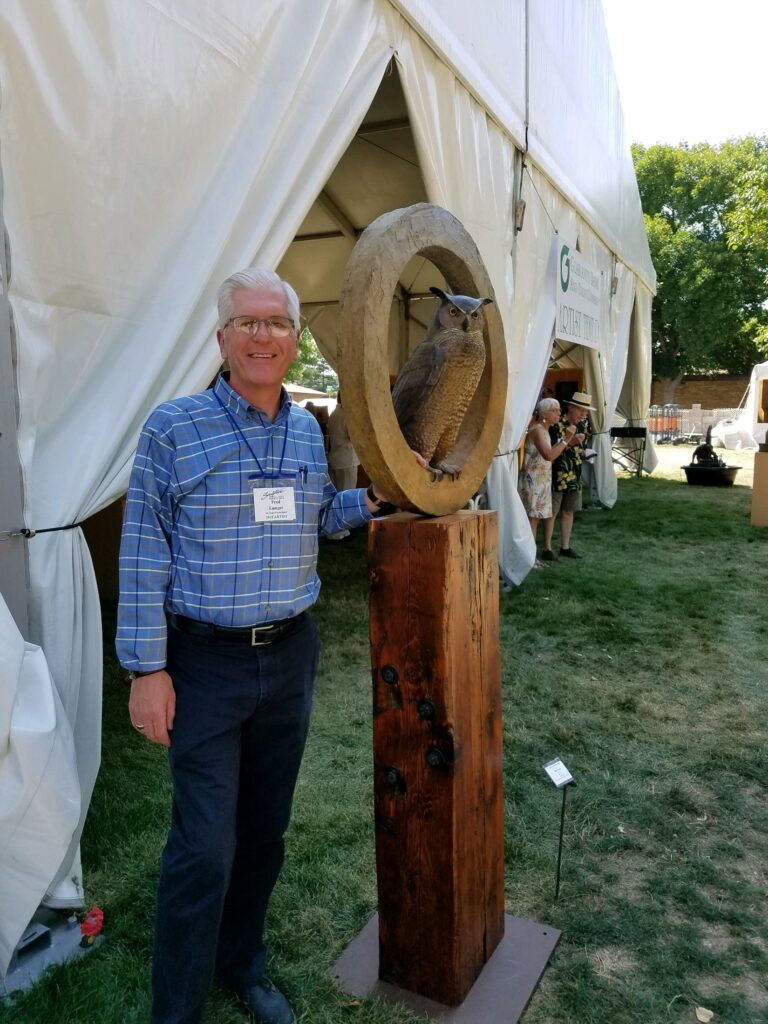 Me with my Great Horned Owl sculpture at the 2018 Loveland Sculpture in the Park