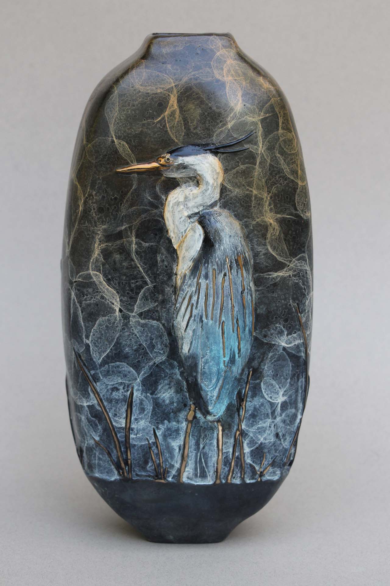 Side 2 of the Great Blue Heron vase. The Blue Heron is in a relaxed position.